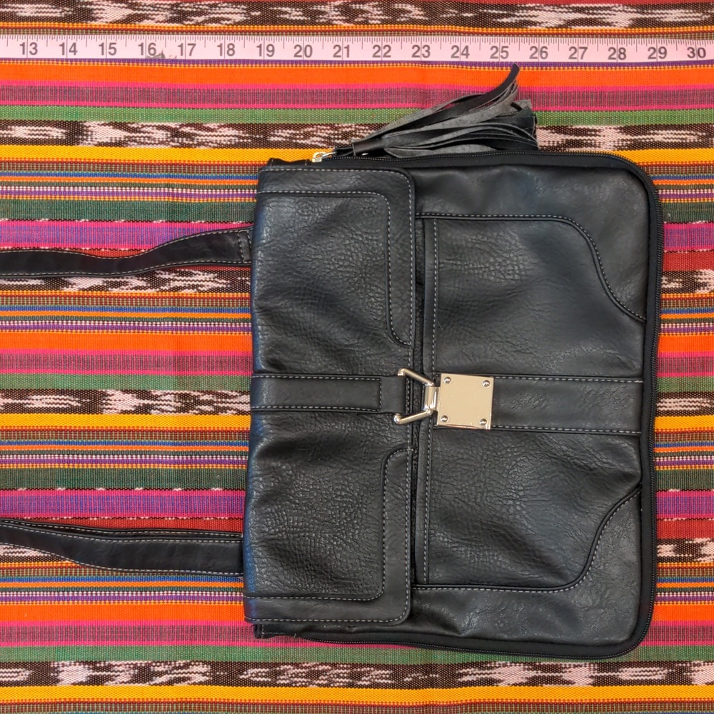 Black PU leather crossbody handbag with silver metal details like new